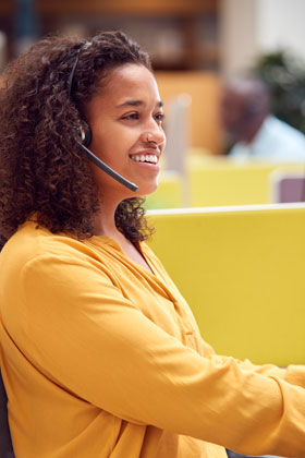 businesswoman-wearing-phone-headset-talking